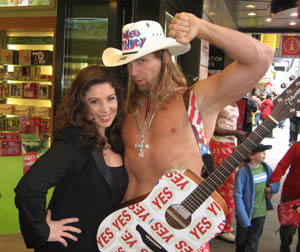 blogsaricowboy With The Naked Cowboy in front of The Body Shop while Durex condoms were being distributed in Times Square.